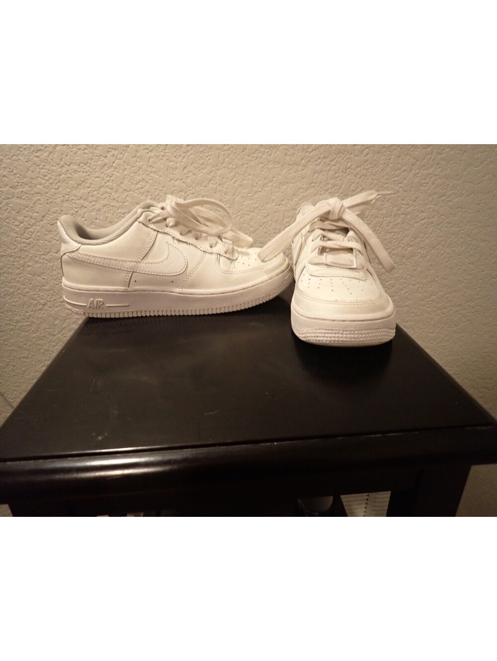 Youth Nike white low top sneakers
